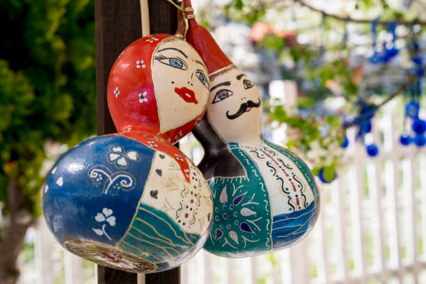 Man and Woman painted on Calabashes stock photo