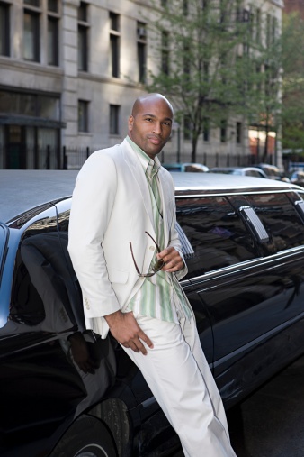 Man By A Limousine Stock Photo - Download Image Now - iStock