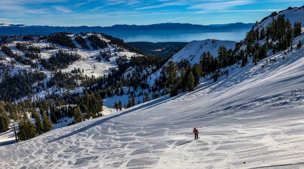 man downhill skiing in Lake Tahoe, Nevada Powder day in North Lake Tahoe californian sierra nevada stock pictures, royalty-free photos & images