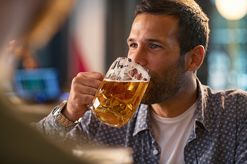 Man Drinking A Pint Of Draft Beer Stock Photo - Download Image Now - iStock