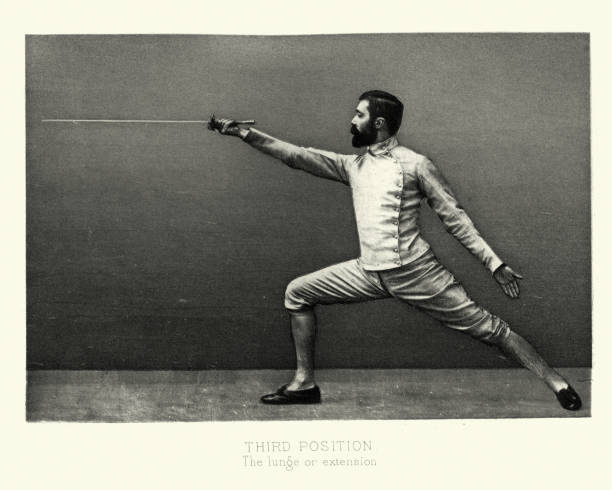 Man fencing, Fencer in third position, lunge or extension, Victorian combat sports, 19th Century stock photo