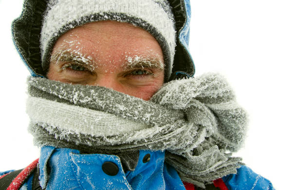 man frozen in outdoor winter storm stock photo