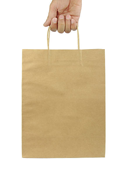 7 268 Hand Holding Paper Bag Stock Photos Pictures Royalty Free Images Istock