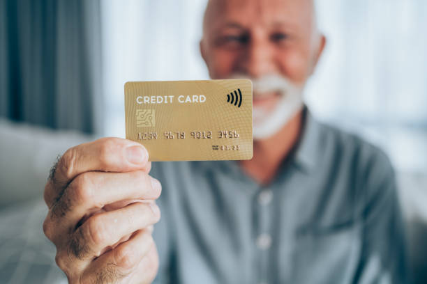 Man holding a credit card. stock photo