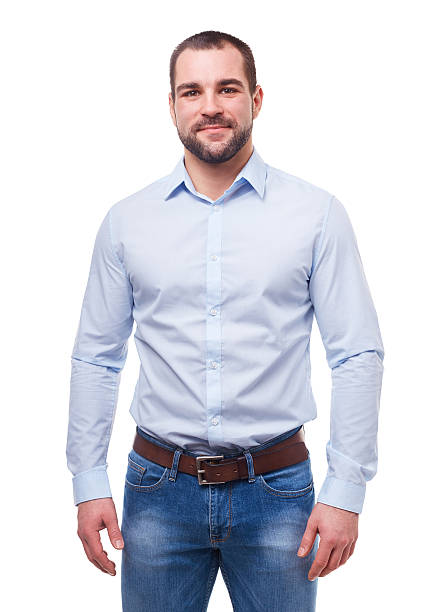 Man in blue shirt isolated on white Young man in blue shirt isolated on white background button down shirt stock pictures, royalty-free photos & images