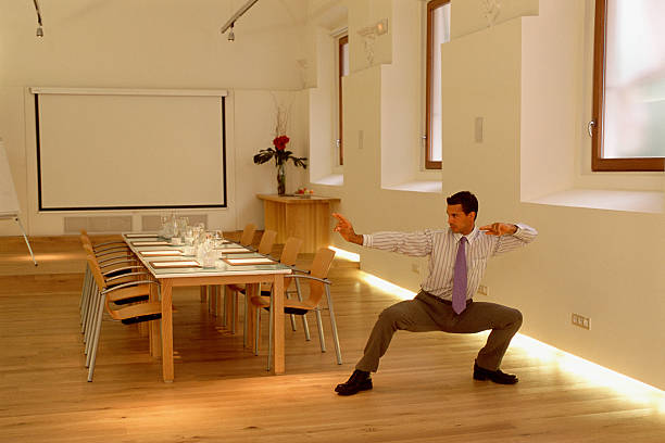 Man in conference room  MBA stock pictures, royalty-free photos & images