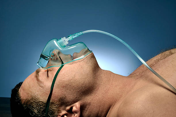 Man in mask oxygen. stock photo