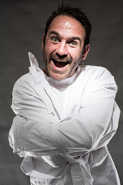 221 Lunatic In A Straitjacket Stock Photos, Pictures & Royalty-Free Images  - iStock