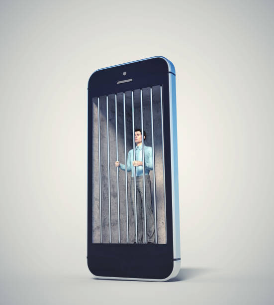 Man inside a phone prison. stock photo
