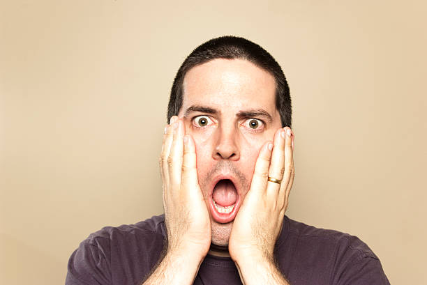 Man is shocked and awed stock photo