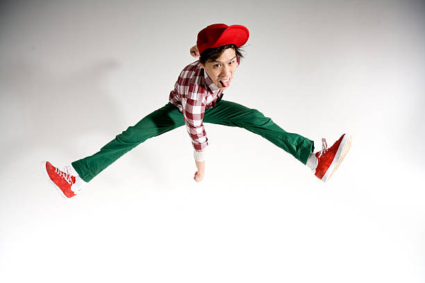 man jumping in the air stock photo