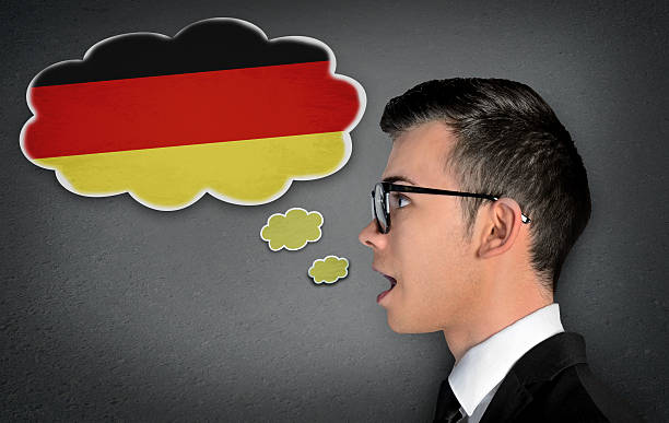 Man learn speaking german Man learn speaking german in bubble german language stock pictures, royalty-free photos & images