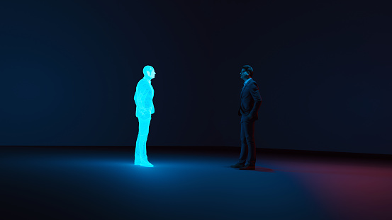 Man stands in a room looking at a clone or avatar of himself. The clone is shown as a hologram. Concept image of future living where cloning becomes normal.
