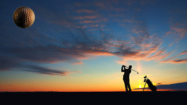 man playing golf A man playing golf on sunset hats off to you stock pictures, royalty-free photos & images