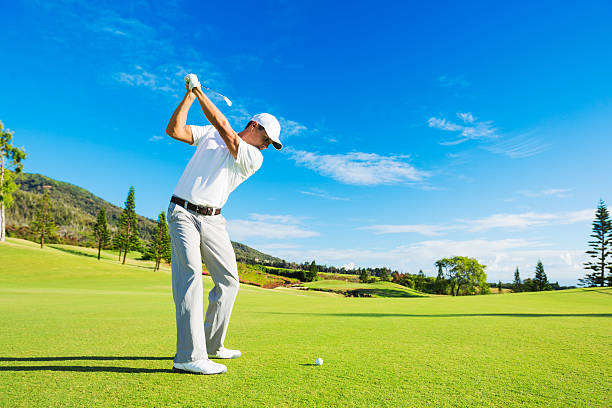 Man Playing Golf Golfer Hitting Golf Shot with Club on the Course hats off to you stock pictures, royalty-free photos & images