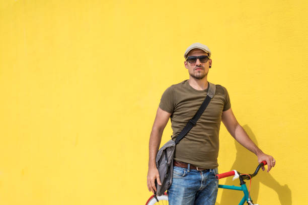 Man posing with his fixed gear bicycle stock photo