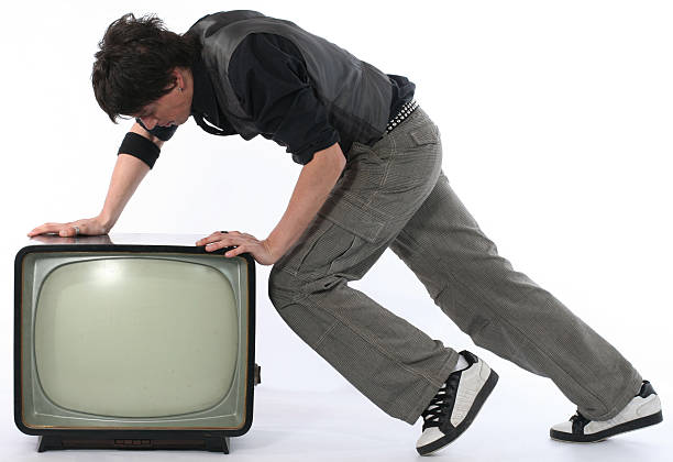 Man push TV away concept stock photo