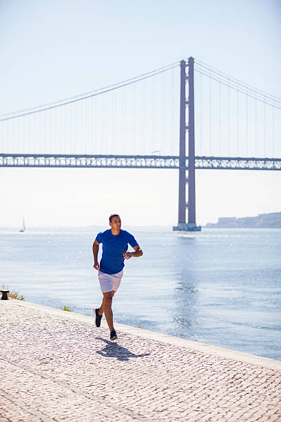 Man running at Lisbon stock photo