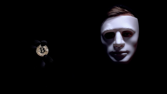 man-showing-bitcoin-fearful-anonymous-mask-on-face-cyber-attack-picture-id1170854876?b=1&k=20&m=1170854876&s=170667a&w=0&h=mXiHF5D0-vOwXbw5ScTk3g5pfbfbNvIiG-cucBOOCHo=