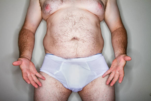 man showing his junk off stock photo