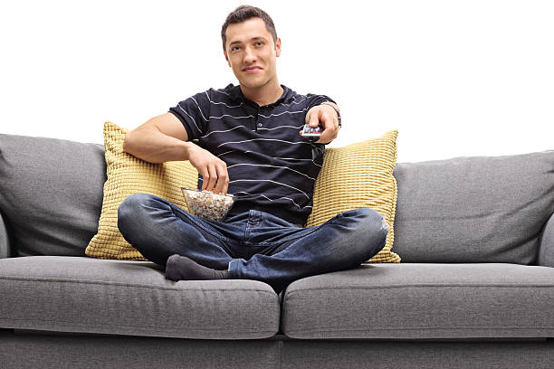 Best Silhouette Of Man Sitting On Couch Stock Photos Best Silhouette Of Man Sitting On Couch Stock Photos