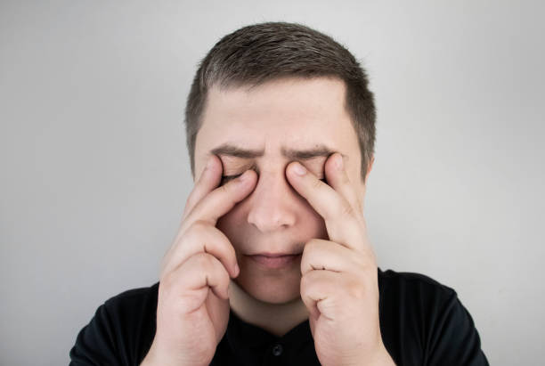 man suffers from pain in the eye patient with ophthalmic disease picture