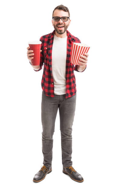 homme se traitant avec le popcorn et le film 3d - 3d man photos et images de collection