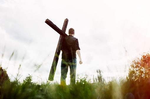 Man Walking With Wood Cross On Shoulder Stock Photo - Download Image
