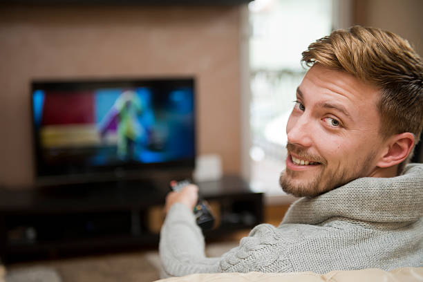 Royalty Free Watching Tv Pictures Images and Stock Photos Royalty Free Watching Tv Pictures Images and Stock Photos