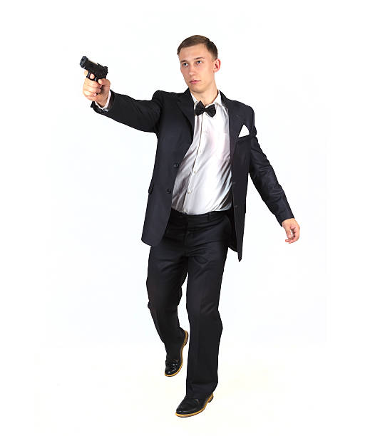 Man Pointing Gun Suit Full Body Pictures, Images and Stock Photos - iStock
