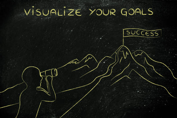 man with binoculars looking at Success flag, visualize your goals stock photo