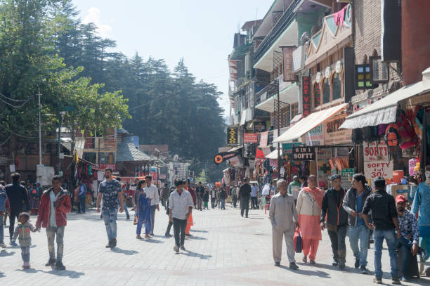 Manali Mall Road landscape in summer. A popular Hill station and tourist weekend gateway with full of showrooms, department stores, shops, restaurants cafes. Shimla Himachal Pradesh India October 2019 Manali Mall Road landscape in summer. A popular Hill station and tourist weekend gateway with full of showrooms, department stores, shops, restaurants cafes. Shimla Himachal Pradesh India October 2019 shimla stock pictures, royalty-free photos & images