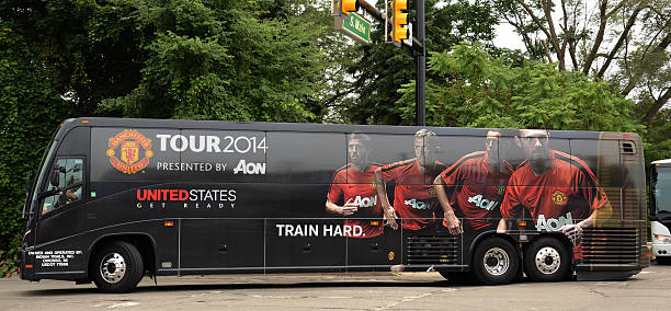 Manchester United Bus in Ann Arbor Ann Arbor, MI, USA - August 2, 2014: Manchester United's team bus arrives for their game against Real Madrid as part of the International Champions Cup on August 2, 2014 in Ann Arbor, MI. Manchester United stock pictures, royalty-free photos & images