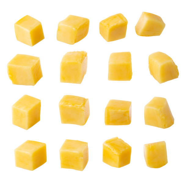 Mango cubes and slices Isolated on a white background stock photo