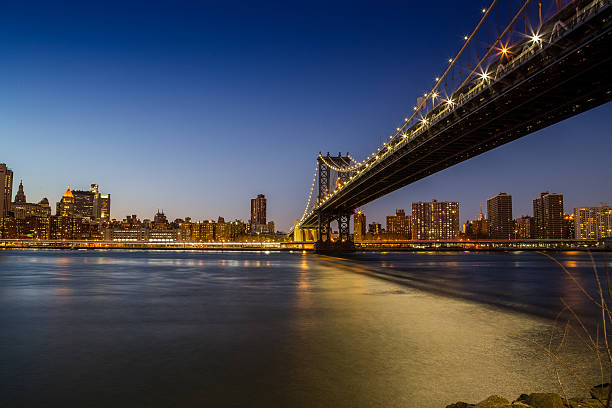 Manhattan Bridge at night stock photo