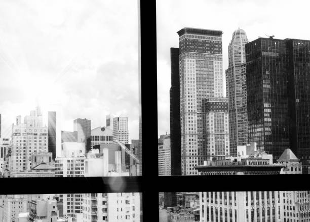 manhattan skyline from a window, nyc. - window, inside apartment, new york imagens e fotografias de stock