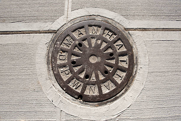 Manhole of the Manhattan sewage system stock photo