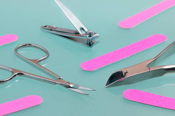 Manicure tool set with turquoise background stock photo