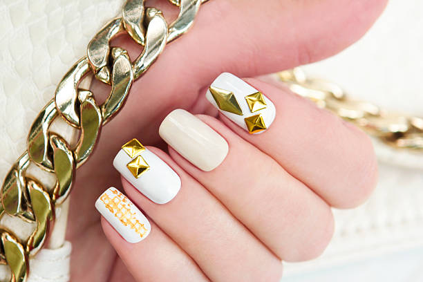 Manicure with gold. stock photo
