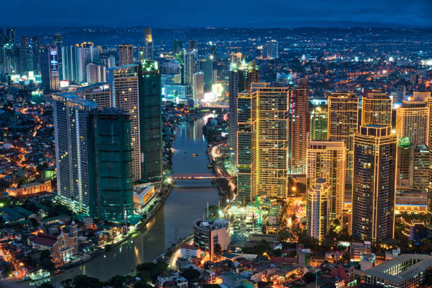 Manila Makati at Twilight Makati Skyline, Metro Manila - Philippines philippines stock pictures, royalty-free photos & images