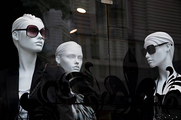 Mannequins in the shop window  mannequin stock pictures, royalty-free photos & images