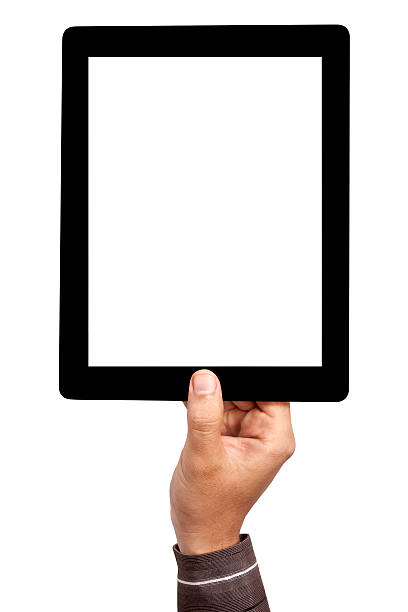 Mans hand holding blank tablet on the air stock photo