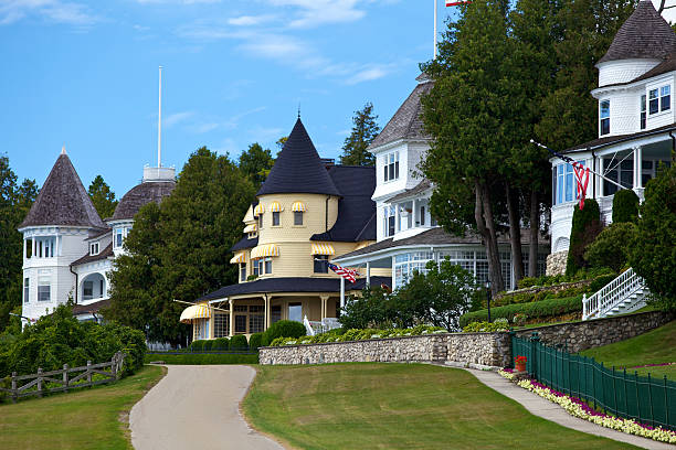 Mansions on Mackinac Island A row of mansions on Mackinac Island mackinac island stock pictures, royalty-free photos & images