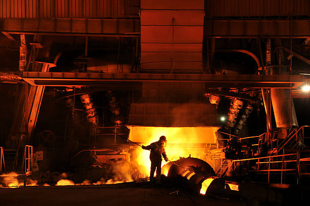 Manual Worker  steel mill stock pictures, royalty-free photos & images