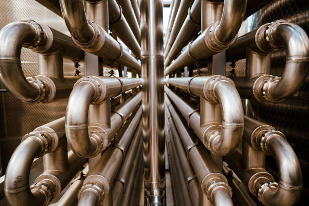 Many alloy inox pipes in a factory stock photo