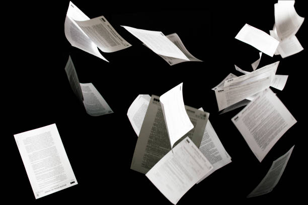 Many flying business documents isolated on black background Papers flying in air in business concept  bureaucracy stock pictures, royalty-free photos & images