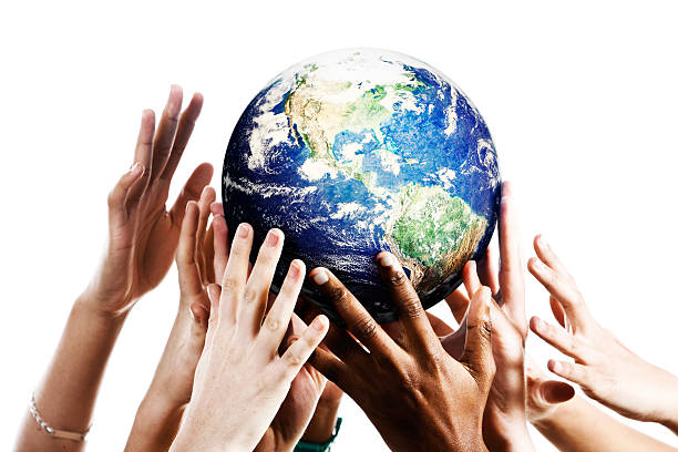 Many hands reach up for Planet Earth Many mixed hands reaching up to grab a piece of Mother Earth. environmental consciousness stock pictures, royalty-free photos & images