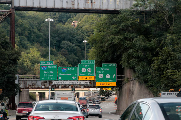 Many Highway Signs and Summer Vehicle Traffic in Pittsburgh stock photo