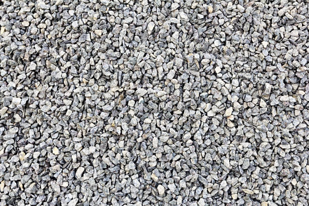 Many small and gray stones Ground stone grey background of many small stones gravel stock pictures, royalty-free photos & images