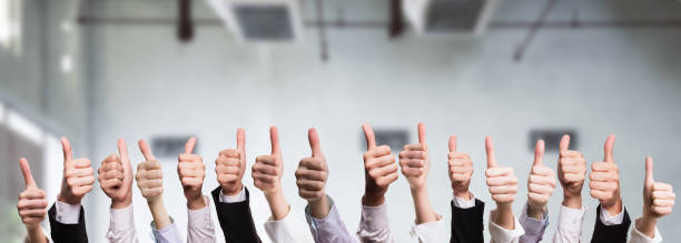 many thumbs up many thumbs up business thumbs up stock pictures, royalty-free photos & images